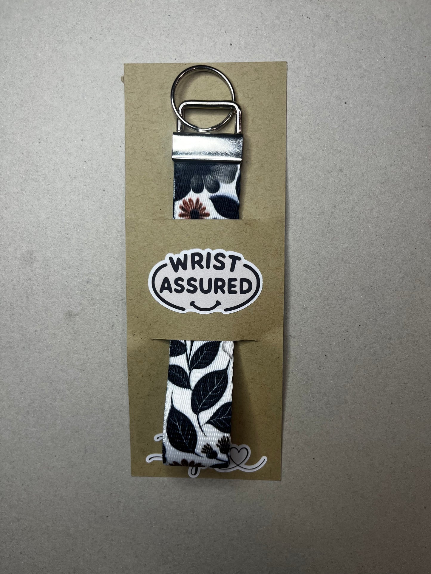 Bold. Minimal. Beautiful Black Flower Wristlet Keychain
