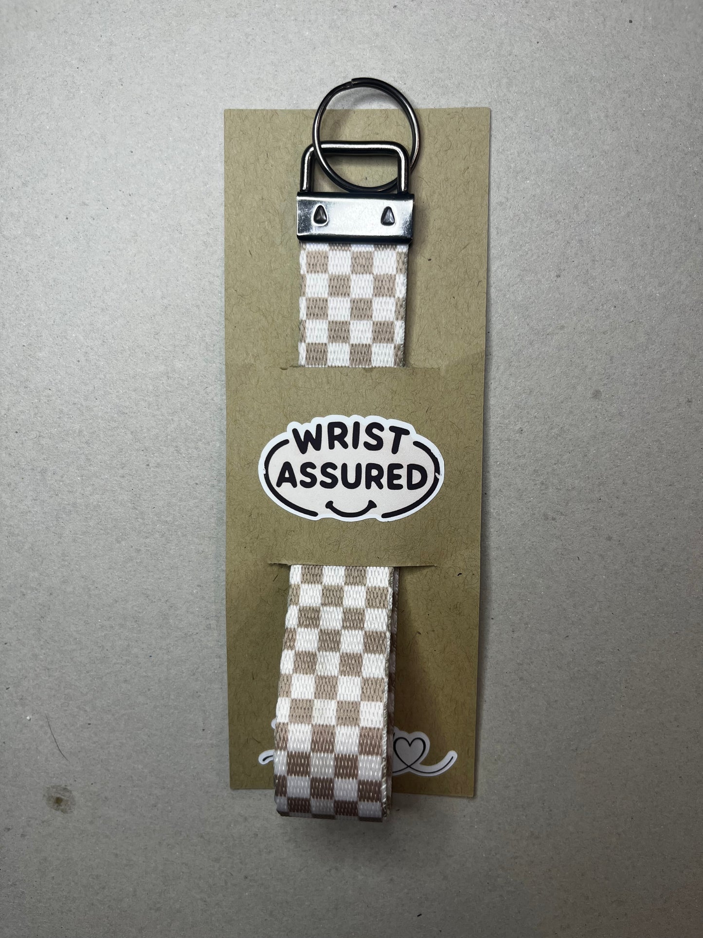 Classic Meets Chic: Brown Checkered Wristlet Keychain