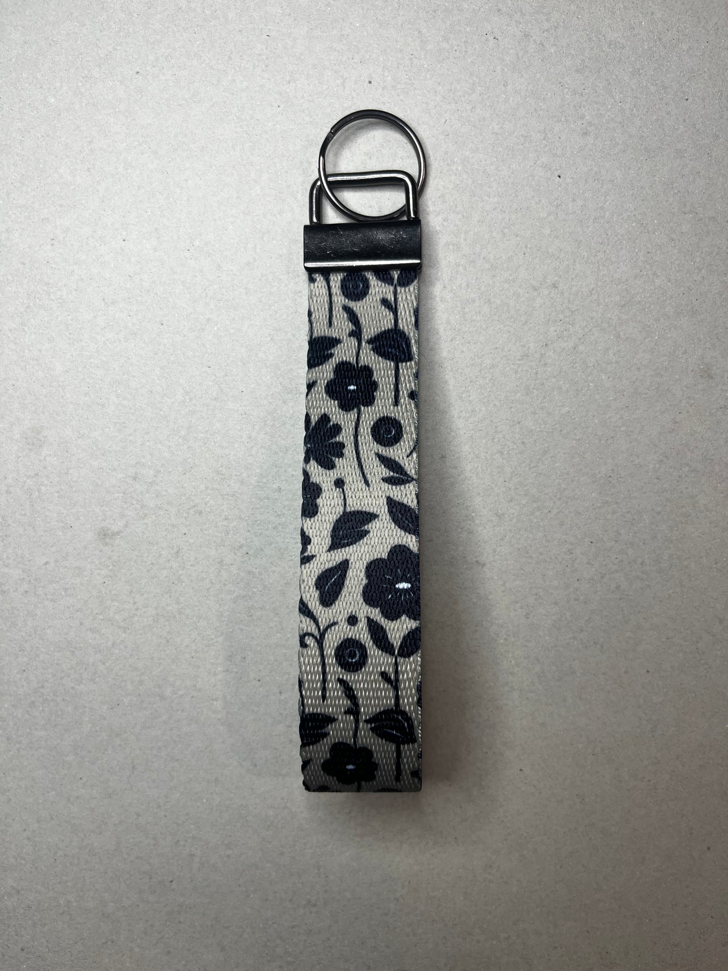 Bold Blossom, Everyday Style. - Big Black Flower Wristlet Keychain