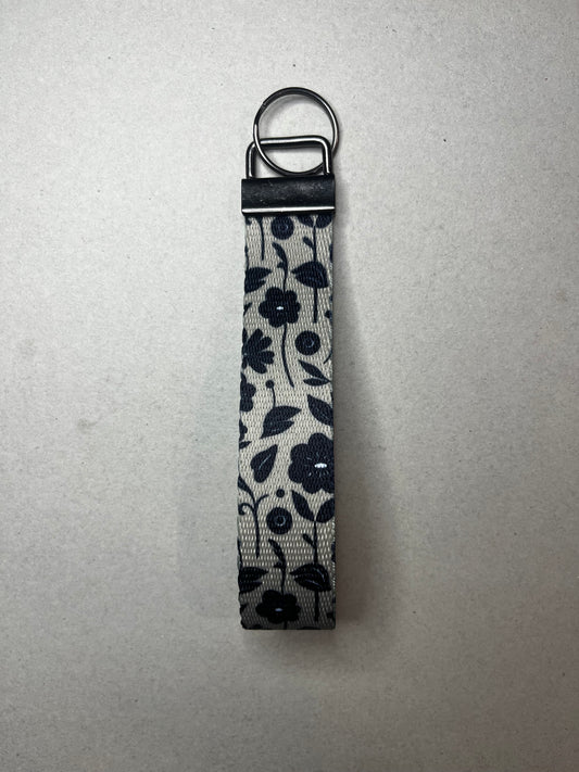 Bold Blossom, Everyday Style. - Big Black Flower Wristlet Keychain
